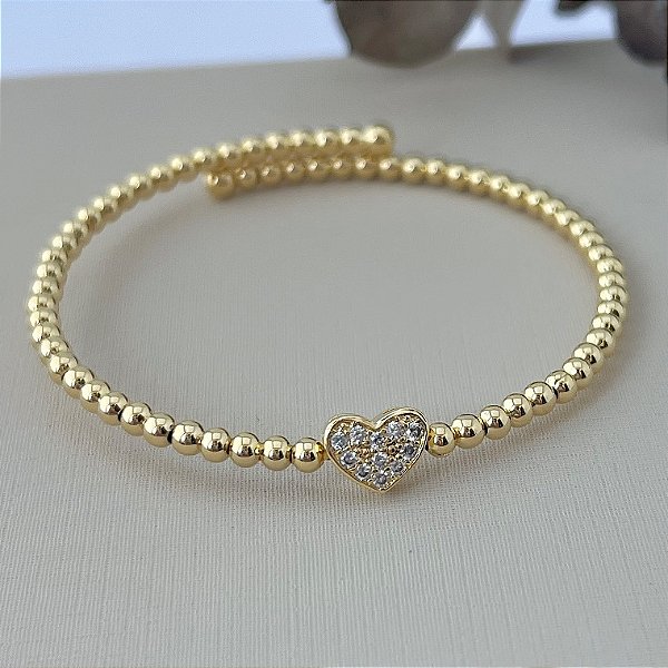 Bracelete de bolinhas com pingente de coração cravejado em banho de ouro 18k