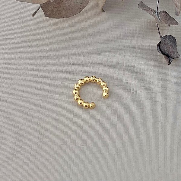 Piercing fake de bolinhas em banho de ouro 18k