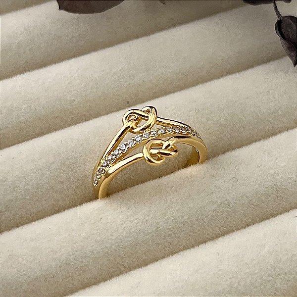 Anel aro 15,5 infinito corda meio cravejado em banho de ouro 18k