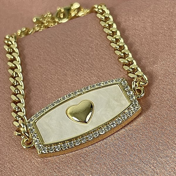 PULSEIRA ELOS COM CHAPA CORAÇÃO ZIRONIA NO DOURADO - SEMIJOIA