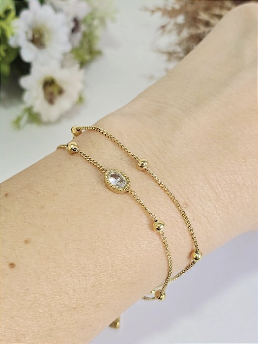 Pulseira Dupla Bolinhas e Ponto de Luz em Aço Banhado a Ouro