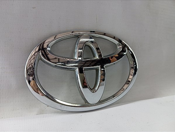 EMBLEMA TOYOTA PARACHOQUE DIANTEIRO TOYOTA YARIS 2019 ORIGI
