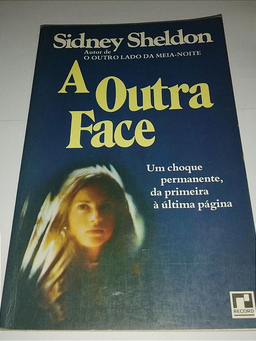 A outra face - Sidney Sheldon - Capa Azul (marcas)