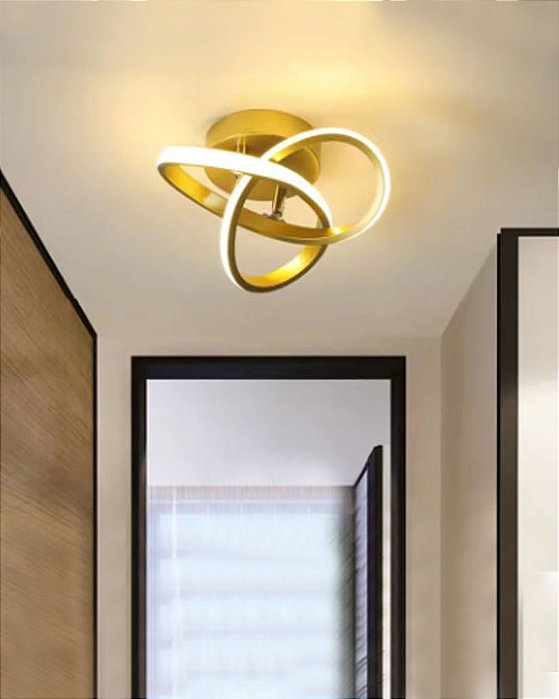Luminária sobrepor 20w infinito curvas dourada luz 3/1