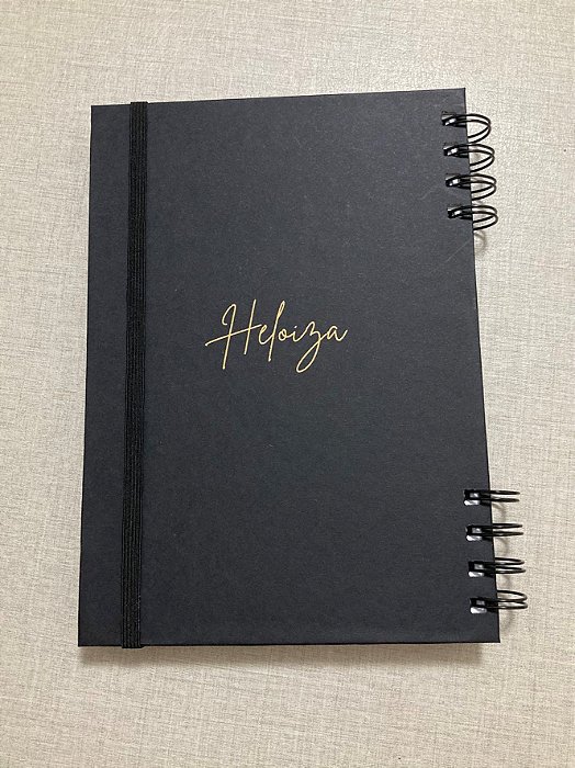 Caderno canhoto fechamento com elástico