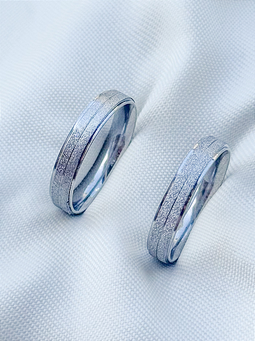 Par de Aliança Diamantada - Aço Inox