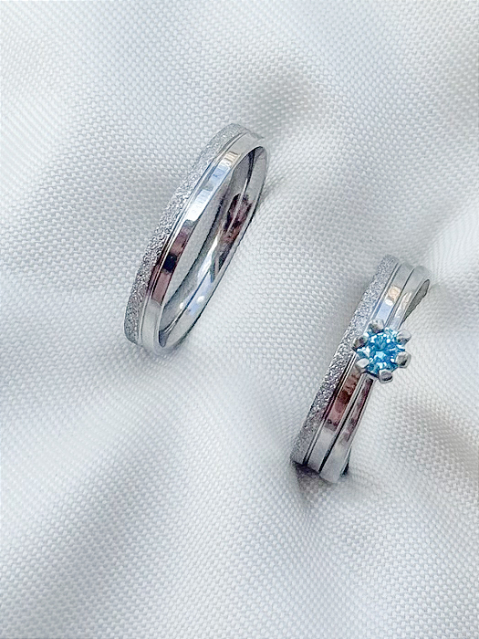 Par de Aliança Alice + Solitário azul - Aço inox