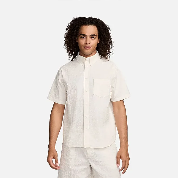 Camisa Nike Essential Swoosh Creme