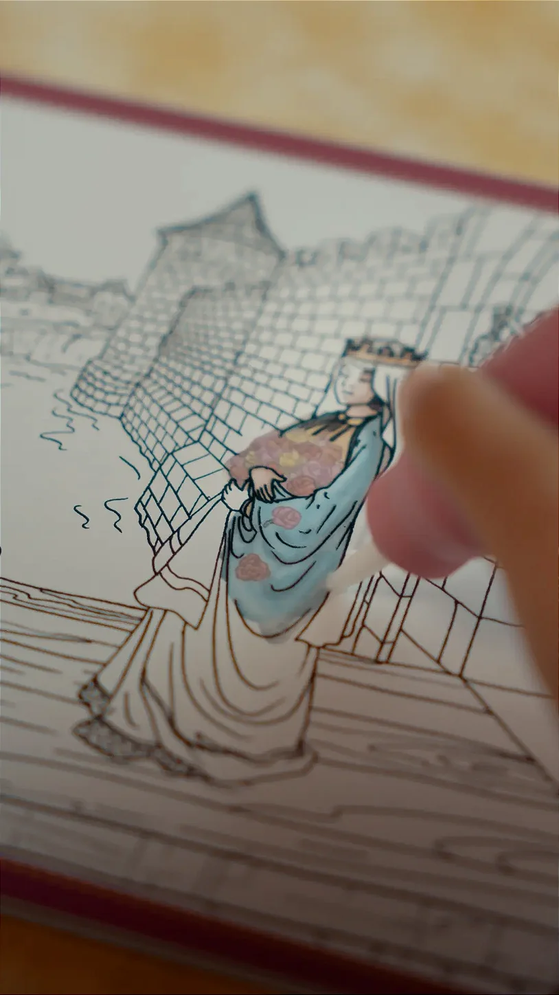 Criança pintando o Aquabook