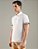 Polo Tommy Hilfiger Masculina- Branca XM05984 - Imagem 2
