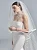 VÉU VIÉS CAPELINE OFF WHITE PRONOVIAS - Imagem 1