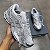 TÊNIS NEW BALANCE 1906A CONCRETE SILVER METALLIC (COMPLETO) - Imagem 1