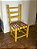Cadeira em madeira na cor amarela com assento em tiras de couro natural - Imagem 2