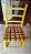 Linda cadeira em madeira amarela com assento em tiras de couro natural mede: 45x42x96 altura - Imagem 4