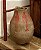 Diferente vaso de barro , antigo, com pintura em vermelho representando folhas, mede 53 cm altura - Imagem 1