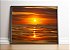 Nascer do sol e um belo céu laranja em fotografia aquática - Imagem 4
