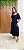 Vestido Preto midi com decote coração, drapeado no busto e mangas amplas tipo borboleta. Ele tem a saia em camadas, que dá movimento e leveza ao look. - Imagem 1