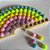 Brinquedo de Madeira -  Arco Íris de Pompons Colorido Candy (Tons Pastéis) - Imagem 2
