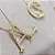 Colar monograma personalizado com duas letras cravejadas - Imagem 12