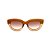 Óculos de sol Gustavo Eyewear G12 3 nas cores doce de leite e âmbar, com as hastes pretas e lentes marrom degrade. - Imagem 1