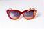 Óculos de Sol Gustavo Eyewear G12 7 nas cores vermelha e laranja, hastes laranjas e lentes marrom. - Imagem 1