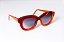 Óculos de Sol Gustavo Eyewear G12 7 nas cores vermelha e laranja, hastes laranjas e lentes marrom. - Imagem 2