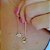 Colar Gravatinha com Pingente de Menina e Patinha Cravejada com Zircônias Cristal Banho em Ouro 18K - Imagem 2