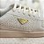 Tenis off white com detalhes dourados - Imagem 2