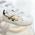 Tênis off white com ouro light - Imagem 1