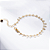 Pulseira Mini Medalhas e Esferas Lisas Banho de Ouro 18k - Imagem 1