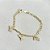 Pulseira Infantil Laços Incolor Banho de Ouro 18k - Imagem 2