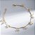 Pulseira Penduricalhos Mini Pérolas Banho de Ouro 18k - Imagem 1