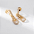 Brinco Elos Entrelaçados Zircônia Incolor Banho de Ouro 18k - Imagem 2
