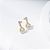 Brinco Chave Zircônia Incolor Banho de Ouro 18K - Imagem 1