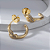 Argola Nó Zircônia Incolor Banho de Ouro 18k - Imagem 2