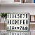 KIT DE LETRAS E EMOJIS PARA LIGTH BOX - G - PRETAS - 1 cartela com 96 peças - Imagem 2