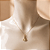 Pingente Nossa Sra. Aparecida folheado a ouro 18k - Imagem 2