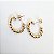 Brinco argola torcido oval folheado a ouro 18k - Imagem 1