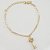 Pulseira com pingente de chave folheada a ouro18k - Imagem 1