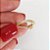 Piercing cravejado folheado no ouro 18k - Imagem 2