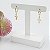 Brinco De Argola "Click Com Cruz Bijou Art - Imagem 2