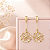 Brinco Banhado a Ouro Pendurado de Flor Com Zircônia Bijou Art - Imagem 1