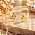 Brinco Pendurado Banhado a Ouro Com Triangulo Liso Com Pedra Bijou Art - Imagem 1