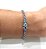 Pulseira riviera prata e banho de ródio e cristal azul - Imagem 2