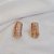 Brinco ear cuff zircônia ouro semijoia 25k02014 - Imagem 1