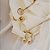 Conjunto brinco e bracelete olho de gato ouro semijoia 6862505 - Imagem 2