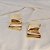 Maxi brinco Palone Design curvado ouro vintage - Imagem 5