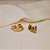 Brinco ear hook aros ouro e ródio fosco semijoia - Imagem 3