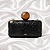 Bolsa Clutch de Couro de Pirarucu Preto OYÁ - Imagem 1