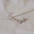 Brinco ear cuff flores zircônia ródio semijoia 26k06022 - Imagem 6